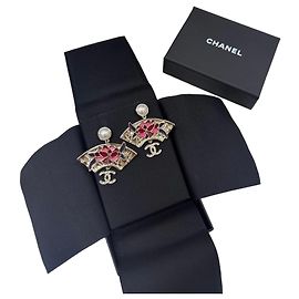 Orecchini Chanel Métiers d'art Camelia in Perle e Ventaglio in Vetro