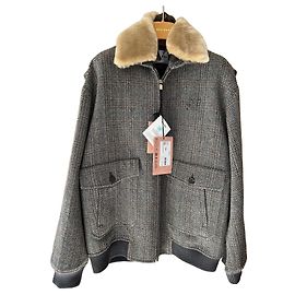 Miu Miu Tweed-Bomberjacke mit Pelzkragen in Grau