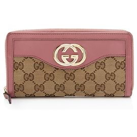 Cartera con cremallera Gucci GG Canvas Sukey