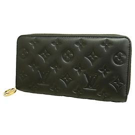 Cartera Louis Vuitton Monogram Coussin Zippy