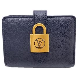 Louis Vuitton Taurillon Portefeuille Low Key Compact Bi-fold Wallet