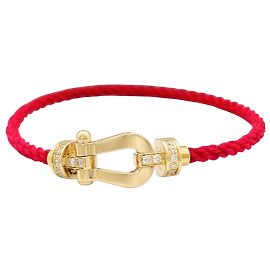 Pulsera Fred, "Force 10, modelo mediano, semi pavé", en oro amarillo y diamantes.