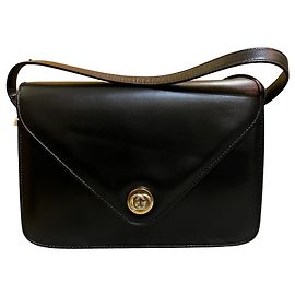 Borsa a tracolla a busta Gucci in pelle di vitello Interlocking G