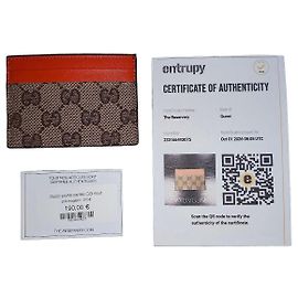 Gucci Portatarjetas GG Supreme en lona recubierta naranja