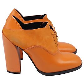 Décolleté mocassini con tacco largo Jil Sander in pelle arancione