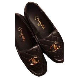 Chanel mocassini in pelle nera matelassé