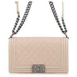 Borsa a tracolla con catena Chanel in pelle d'agnello beige