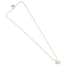 Pendente Christian Dior CD in metallo