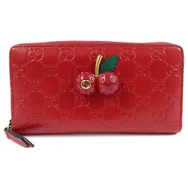 Portafoglio lungo chiuso da zip rotondo Guccissima in pelle Cherry rosso GUCCI 476049