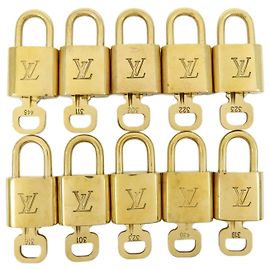 Louis Vuitton Lotto di 10 Lucchetti e Chiavi in Metallo Gold
