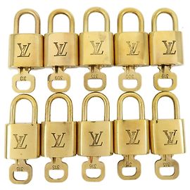 Louis Vuitton Lotto di 10 Lucchetti e Chiavi in Metallo Cadena Oro