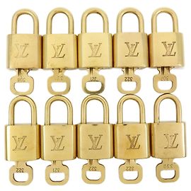 Louis Vuitton Lotto di 10 Lucchetti e Chiavi in Metallo Gold