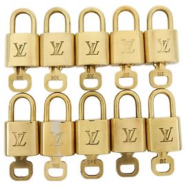 Louis Vuitton Lotto di 10 Lucchetti e Chiavi in Metallo Oro