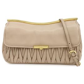 Bolso de hombro con cadena MIU MIU de piel nappa matelassé Rosa Beige