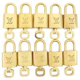 Louis Vuitton Lotto di 10 Lucchetti e Chiavi in Metallo Oro