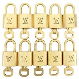 Louis Vuitton Lotto di 10 Lucchetti e Chiavi in Metallo Oro