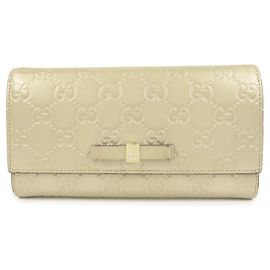 GUCCI Guccissima Interlocking G Portafoglio lungo con patta Gold 388679