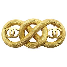 Broche Infinito Chanel Gold CC chapado en oro