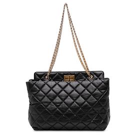 Borsa Chanel Reissue 2.55 in pelle di vitello invecchiata matelassé nera