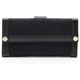 Cartera Continental Gucci GG Canvas Charmy