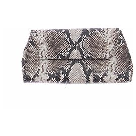 Autre Marque Clutch mit Schlangenprint
