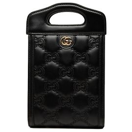 Borsa Satchel Gucci Mini GG Matelassé in pelle di vitello nera con manico traforato