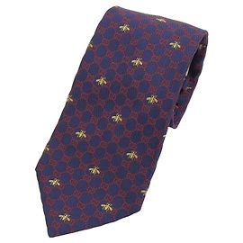 Cravatta in seta GUCCI con logo GG e ricamo ape