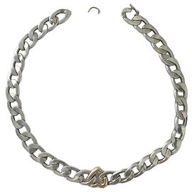 Yves Saint Laurent Collana a cuore in oro 18K catena gourmette argento 925 nel suo scrigno