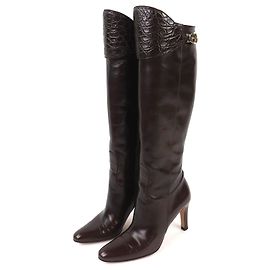 Stivali alti in pelle di coccodrillo Gucci