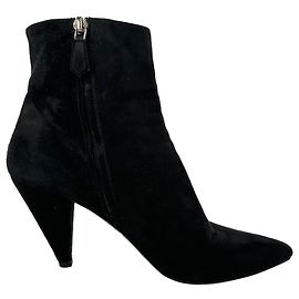 Bottines à talons et bout pointu Prada en daim noir