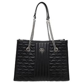 Gucci Un prodotto caratterizzato da un motivo trapuntato tridimensionale e dal logo double G sul davanti. Una silhouette strutturata è completata dalla disposizione armoniosa di dettagli di cuciture verticali sul