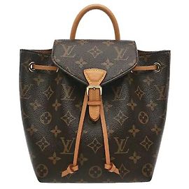 Louis Vuitton A product characterized by Monogram canvas and a compact backpack silhouette. Leather trimming and gold-tone hardware are harmoniously added to the classic Monogram pattern, and the drawstring and