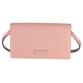 Cartera bandolera Gucci de piel de becerro Microguccissima rosa palo