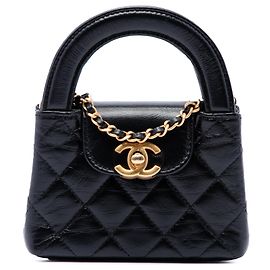 Chanel Kelly Shopper Bag Nano aus schwarzem gealtertem Kalbsleder