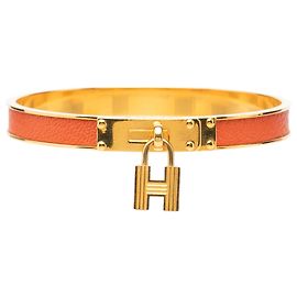 Hermès Orange Armreif aus Leder, goldplattiert, Kelly Cadena Lock