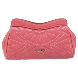 Miu Miu Sac à épaule en cuir verni rose