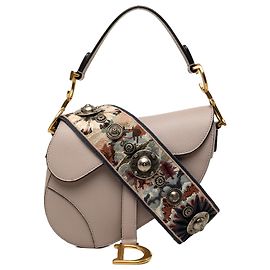 Bolsa Saddle Dior Mini em pele de vitelo granulada roxa