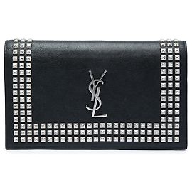 Autre Marque Clutch Monogram in pelle borchiata nera Saint Laurent