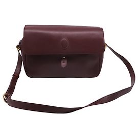 Borsa a tracolla con patta Must de Cartier in pelle Burgundy