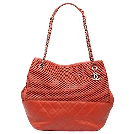 Chanel Up In The Air North South Tote aus perforiertem Kalbsleder Orange