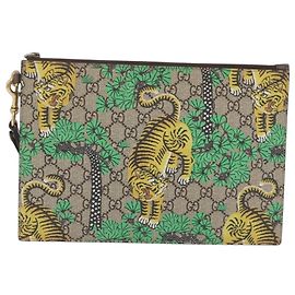 Gucci GG Supreme Tiger Clutch Beige Oro
