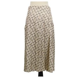 Gonna midi plissettata Gucci beige in seta con stampa Invite Stamp