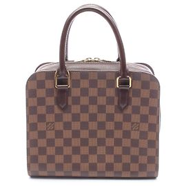Louis Vuitton Triana Handtasche aus PVC-beschichtetem Canvas