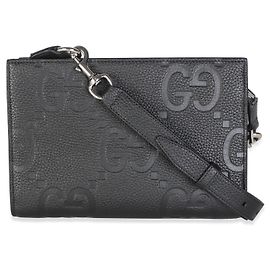 Borsa polsino messenger Gucci in pelle di vitello Dollar testurizzata con monogramma Jumbo GG nero