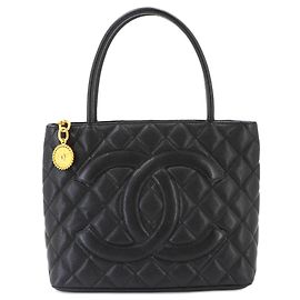 Borsa Tote Chanel Medallion in pelle di vitello granulata nera