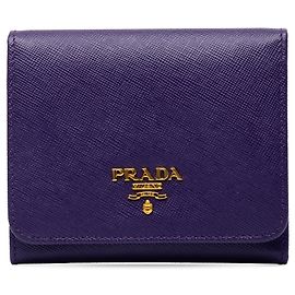 Prada Saffiano Trifold Portemonnaie Lila
Kleine Portemonnaies