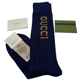 Gucci – Chaussettes côtelées bleu marine avec logo jaune – Taille S