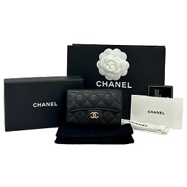 Chanel Portacarte classico in metallo dorato Caviar Black
