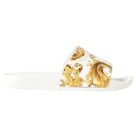 Versace Sandalias slide de goma estampadas