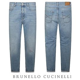 Brunello Cucinelli Pantalones de denim lavado para hombre
